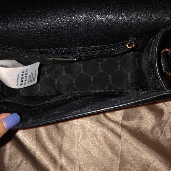 I am selling a black crossover body Aldo bag. - Picture 3 of 3